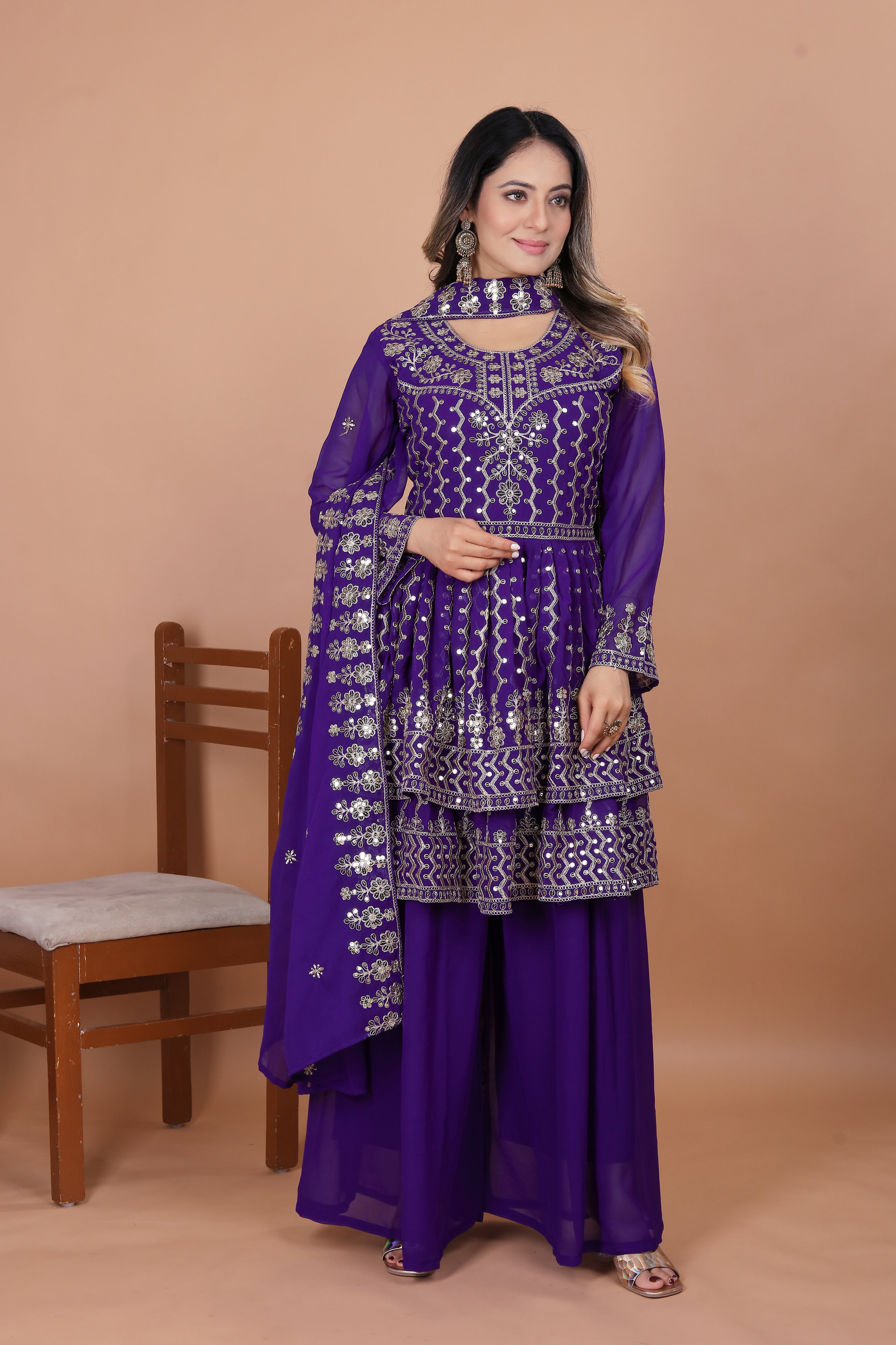 Purple Peplum Style Sharara Suit with Heavy Golden Embroidery and Sequin Detailing