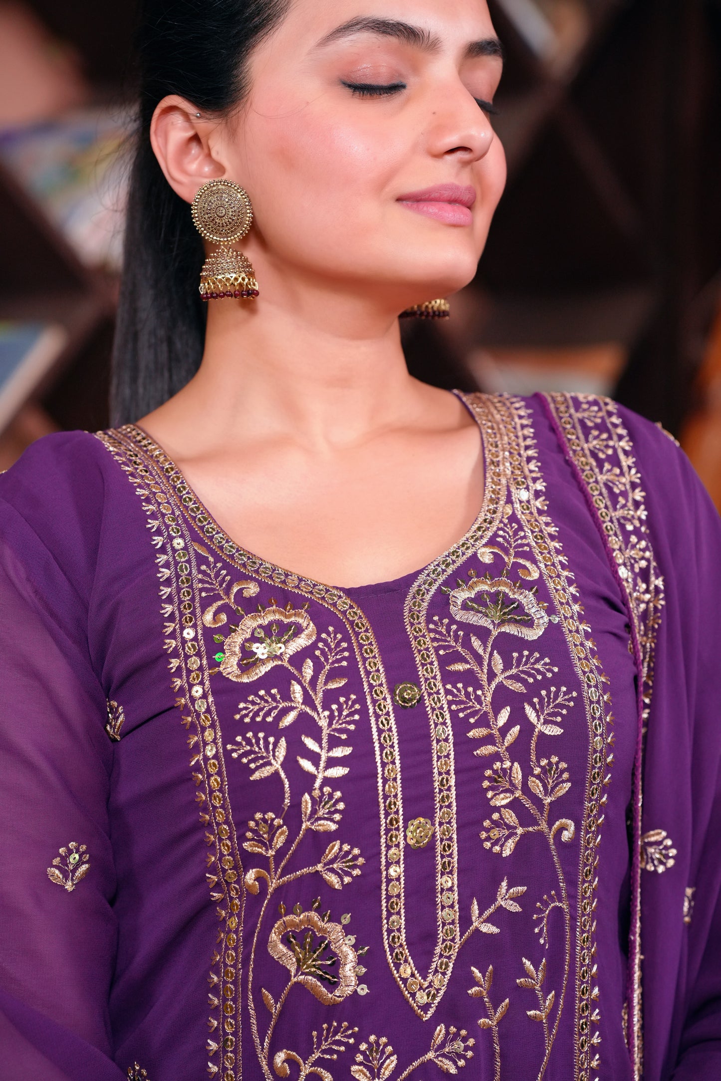 Purple Georgette Anarkali Suit with Intricate Golden Zari & Sequin Detailing Ask ChatGPT