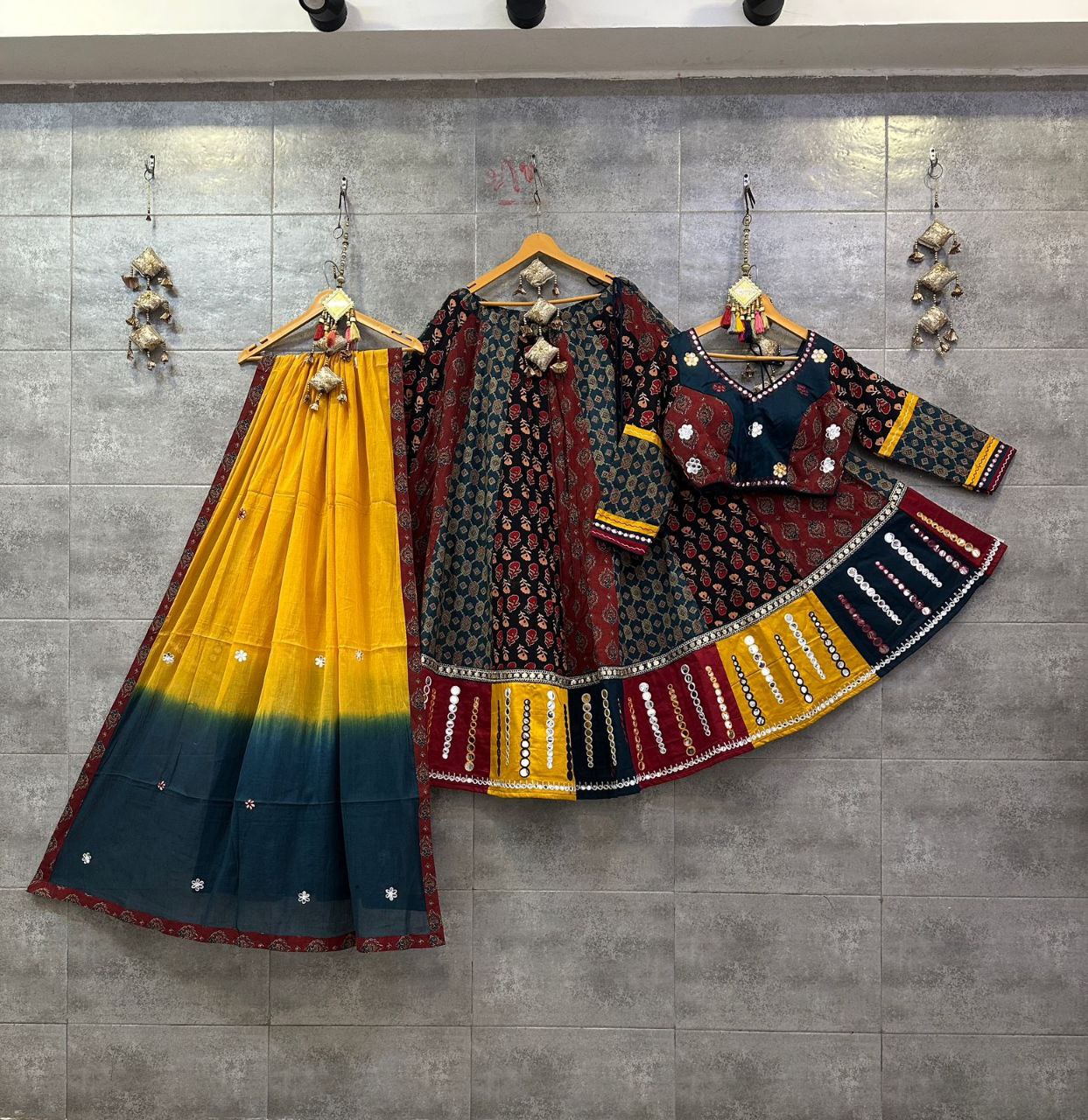 Rust Camric Cotton Chaniya Choli with Aari Work & Mirror Dupatta