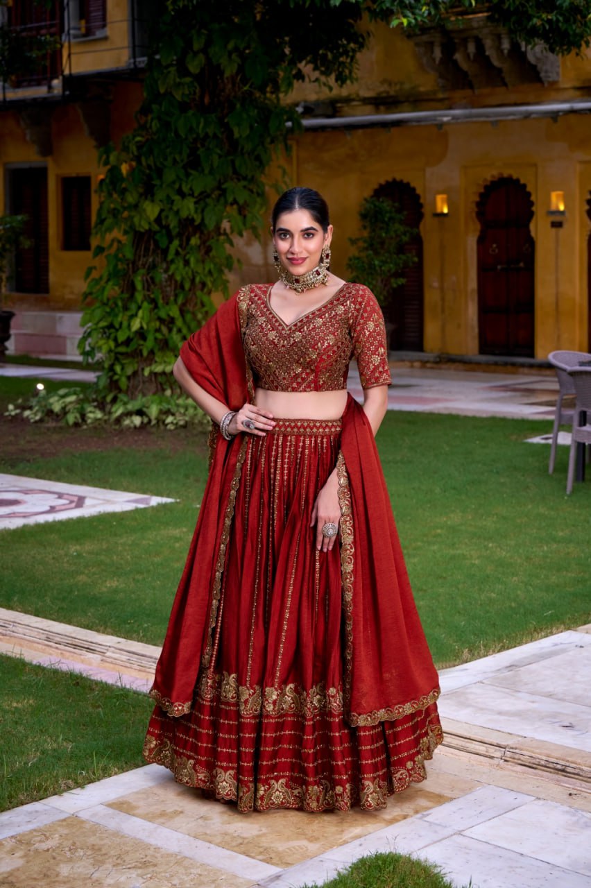 Designer Rust Orange Rangoli Silk Party Wear Lehenga Choli