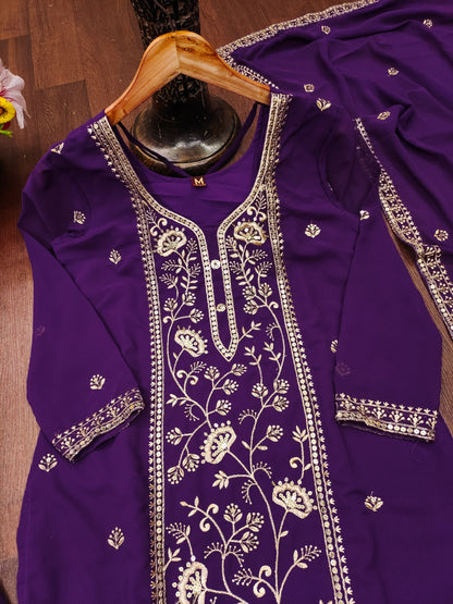 Purple Georgette Anarkali Suit with Intricate Golden Zari & Sequin Detailing          Ask ChatGPT