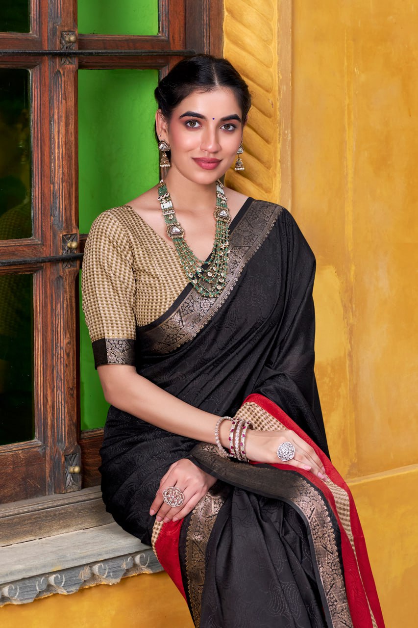 Black Poly Cotton Printed Zari Saree with A Red And Gold Border