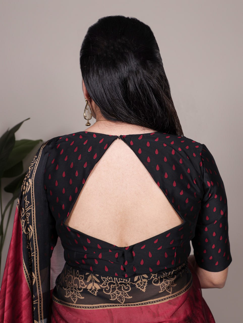 Maroon Rangoli Silk Printed Saree with Black and Gold Printed Border