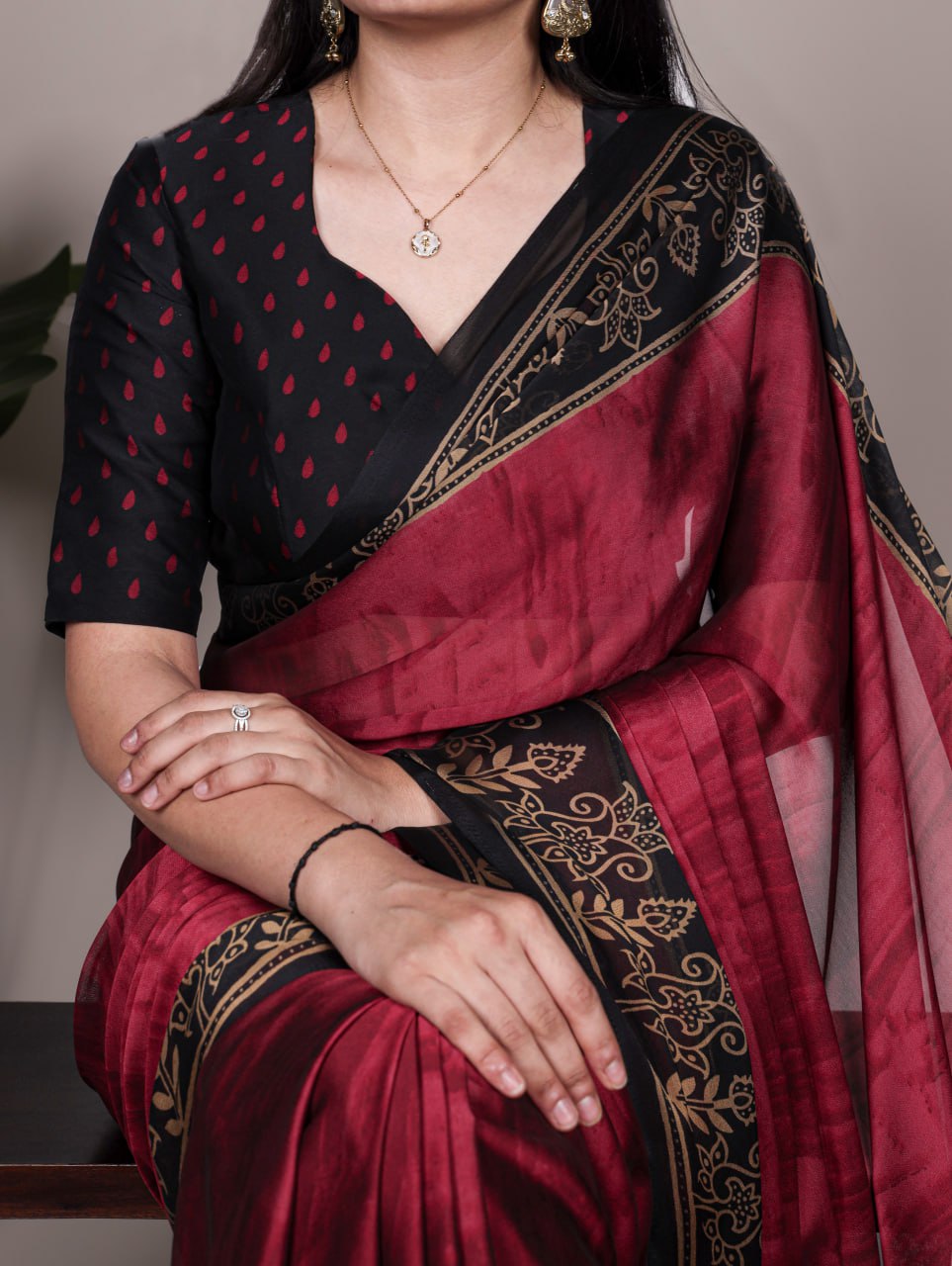 Maroon Rangoli Silk Printed Saree with Black and Gold Printed Border