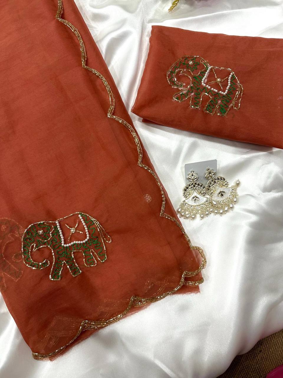 Orange Pure Organza Elephant Motif Val Saree with Thread Handwork Border