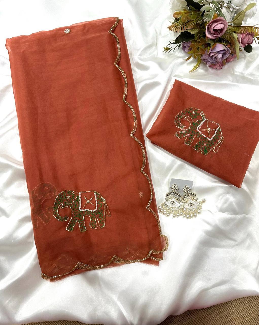Orange Pure Organza Elephant Motif Val Saree with Thread Handwork Border