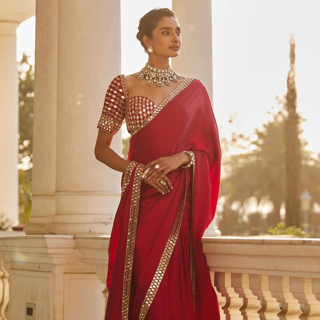 Red Satin Silk Saree With A Mirror And Embroidery Work Blouse
