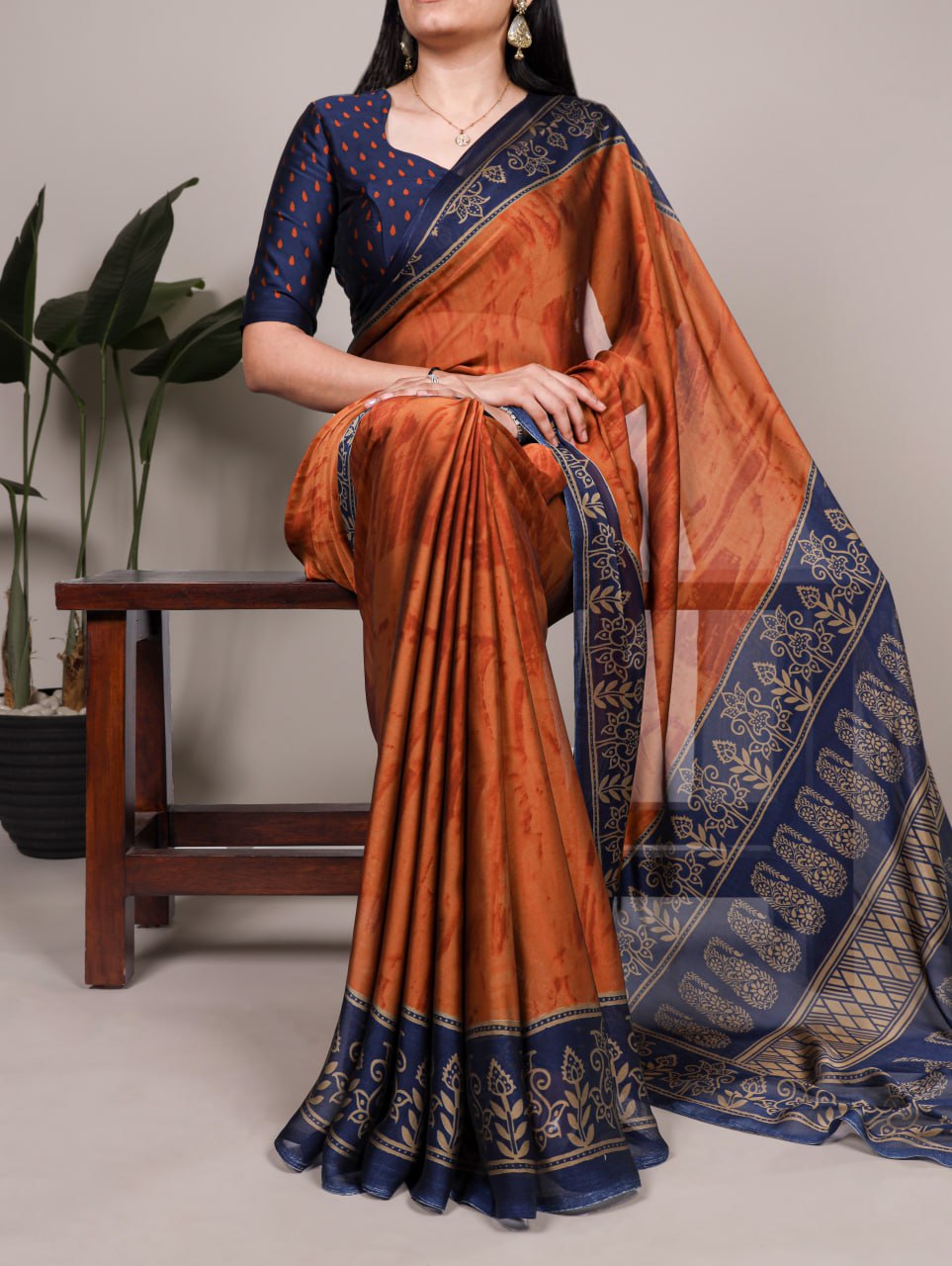 Rust Orange Rangoli Silk Printed Saree with Navy Blue Printed Blouse