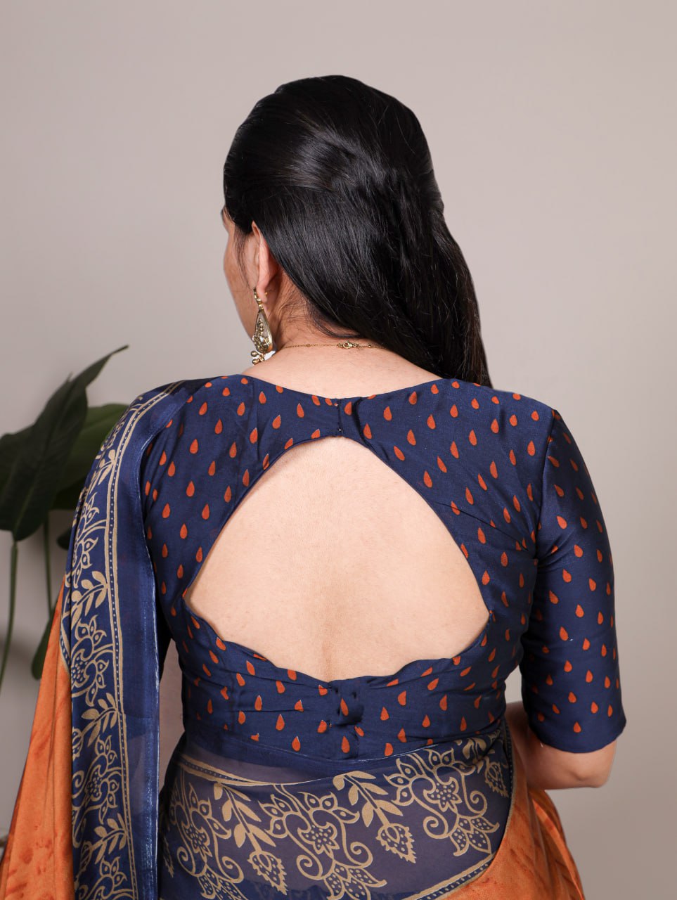 Rust Orange Rangoli Silk Printed Saree with Navy Blue Printed Blouse