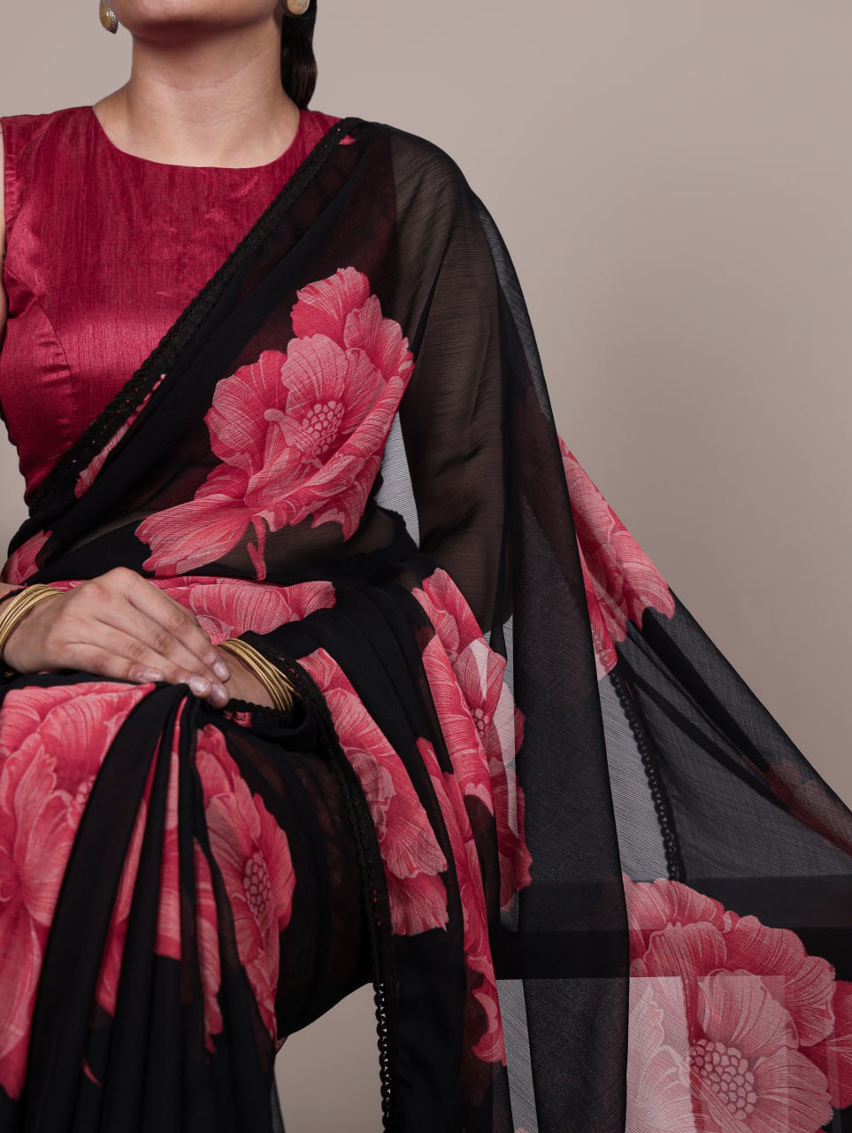 Black Chiffon Saree With A Pink Floral Print And Lace Border