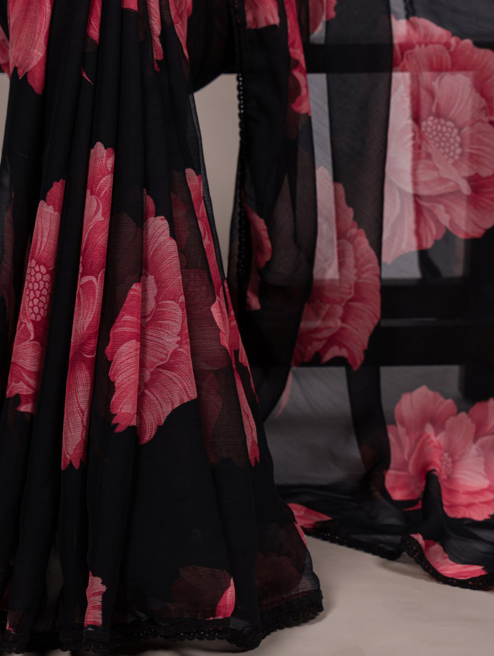 Black Chiffon Saree With A Pink Floral Print And Lace Border