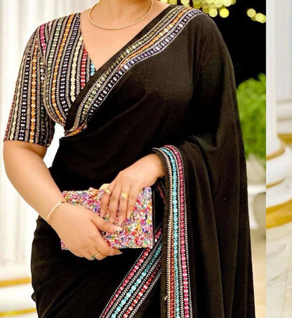 Black Elegant Georgette Saree with A Multicolour Embroidered Blouse