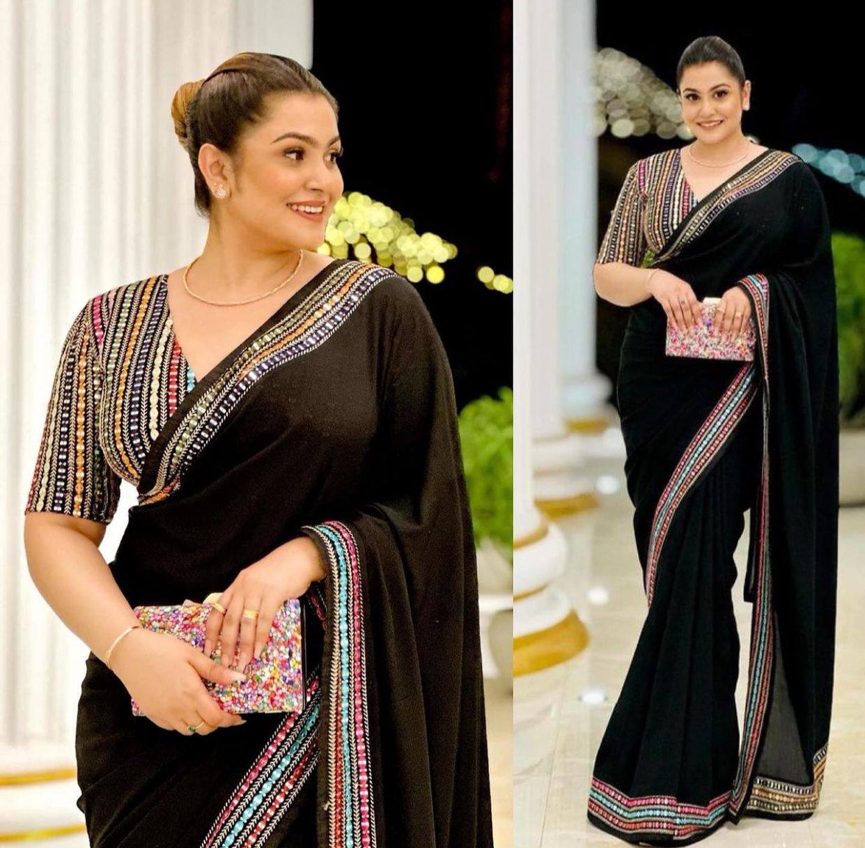 Black Elegant Georgette Saree with A Multicolour Embroidered Blouse