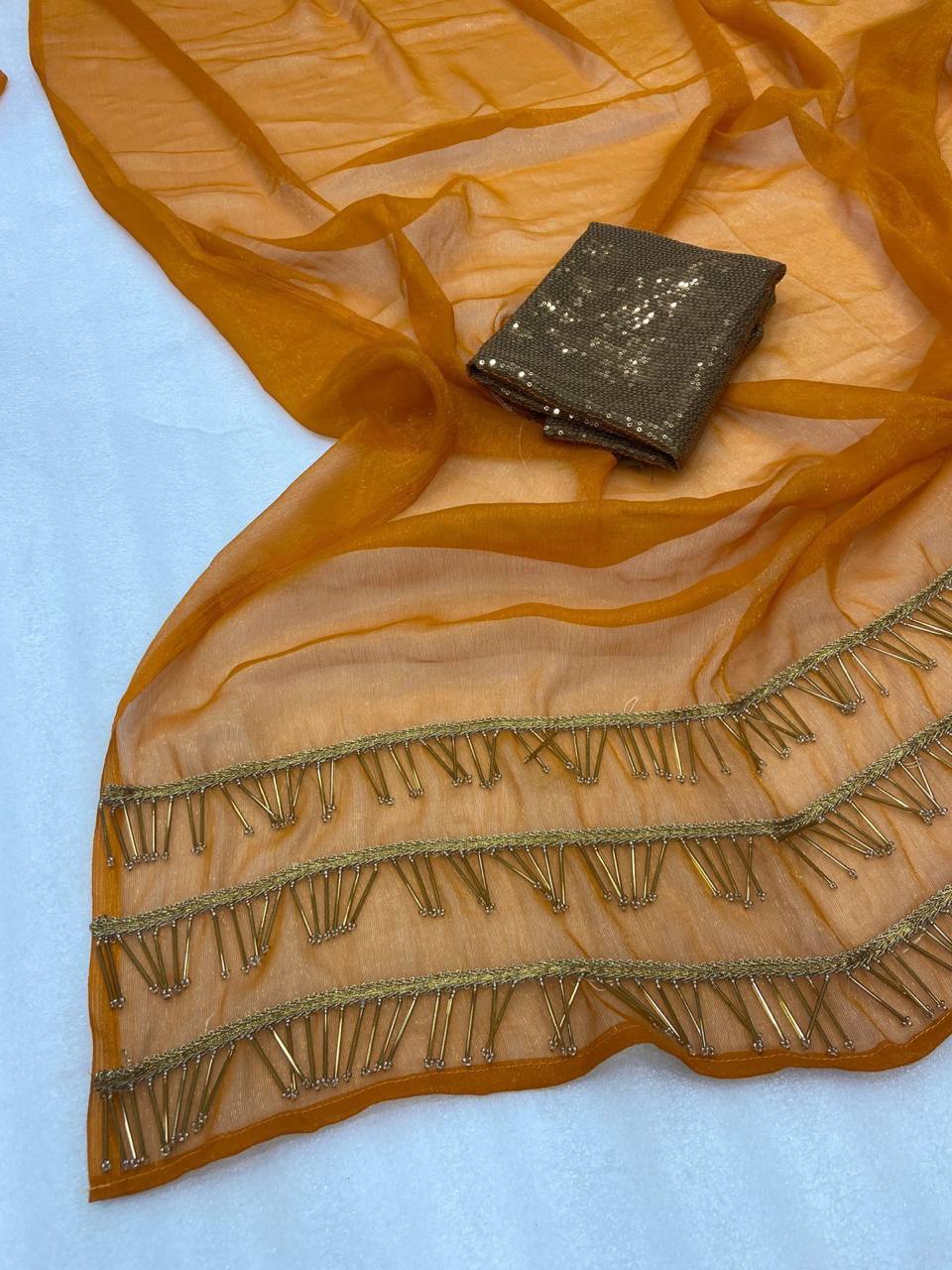 Burnt Orange Simmar Silk Saree with Handwork Latkan Border