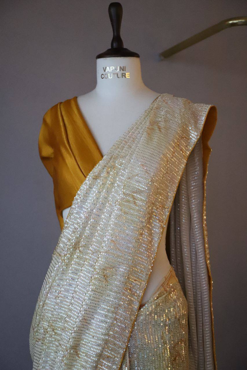 Cream Georgette Digital Print Saree with Full Sequins Contrast Border