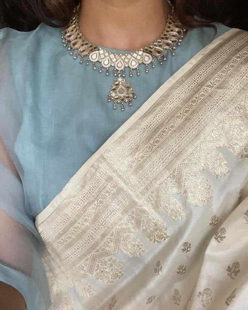 Cream Traditional Kanchipuram Silk Saree with Rich Zari Weaving Border