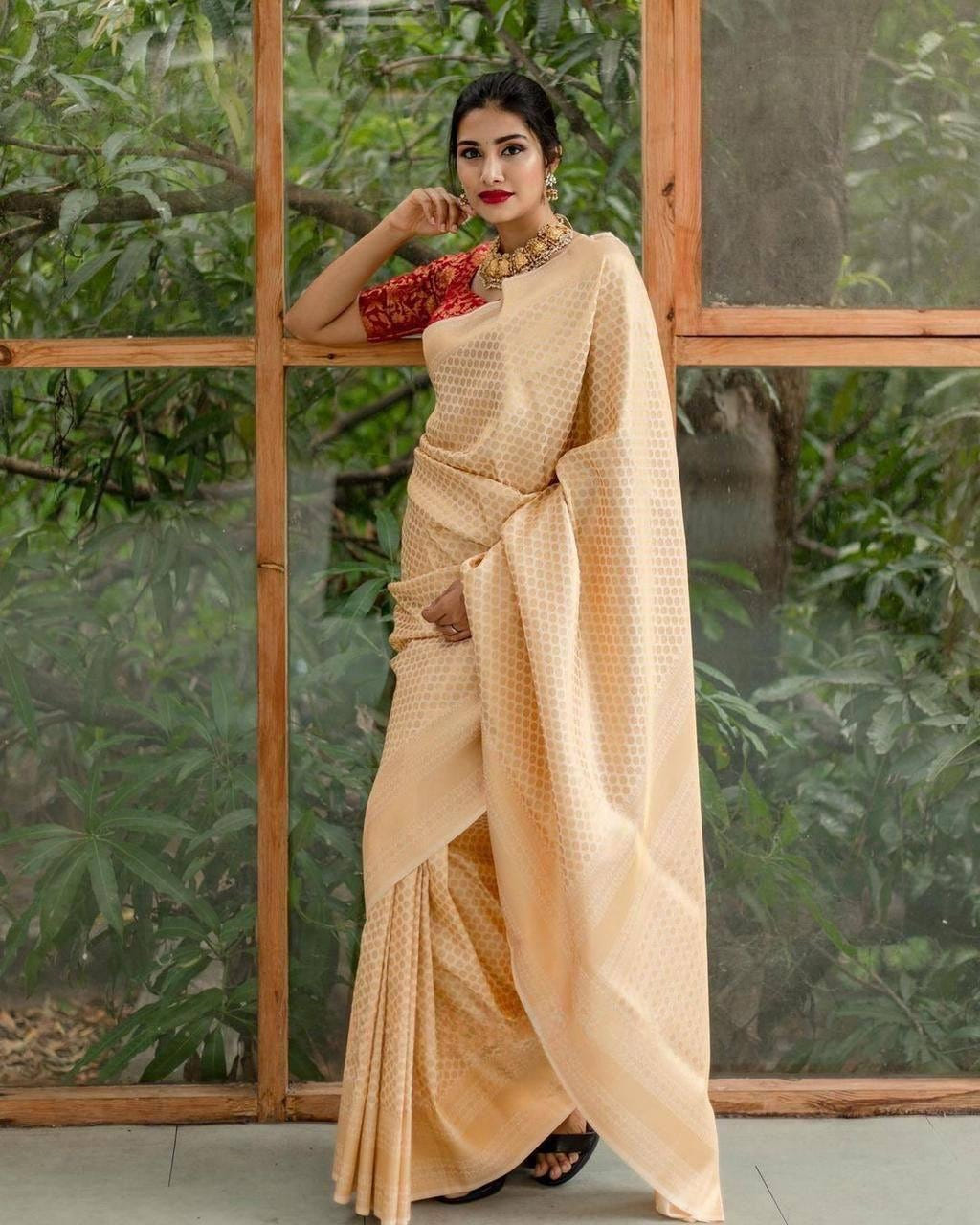 Cream Traditional Kanchipuram Weaving Saree with Red Woven Blouse