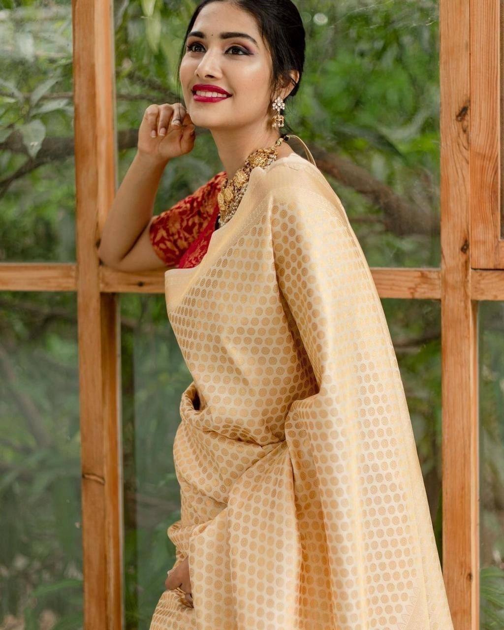 Cream Traditional Kanchipuram Weaving Saree with Red Woven Blouse