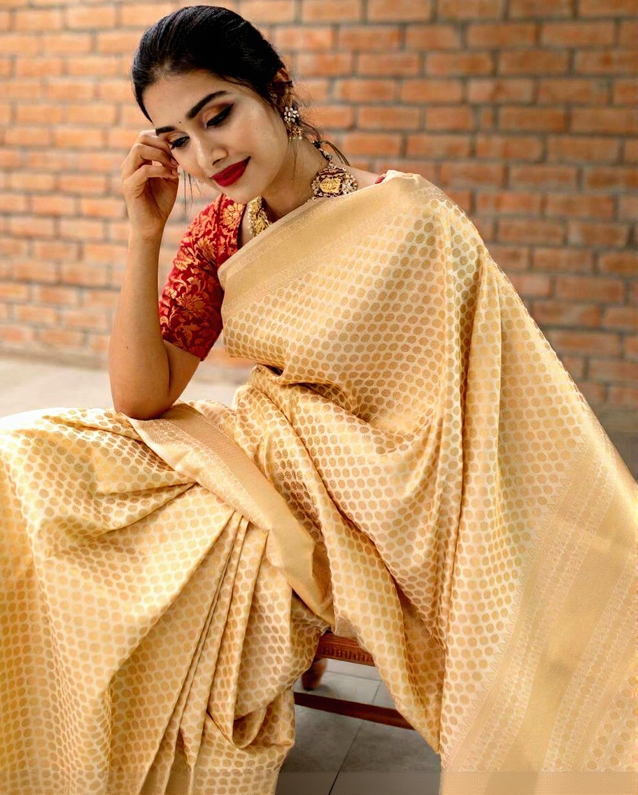 Cream Traditional Kanchipuram Weaving Saree with Red Woven Blouse