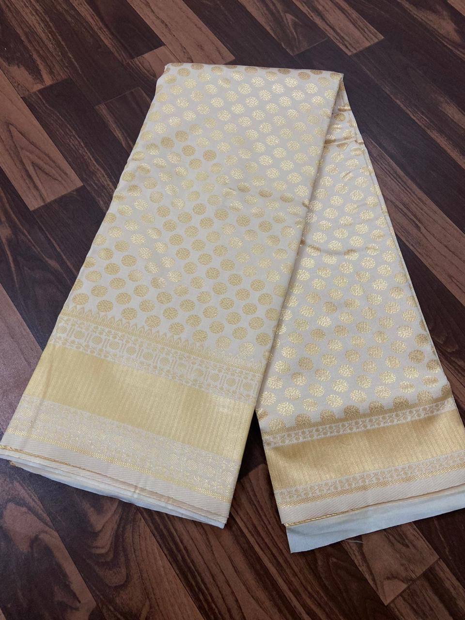 Cream Traditional Kanchipuram Weaving Saree with Red Woven Blouse