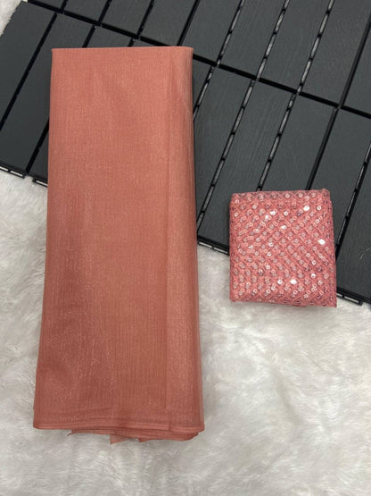 Dusty Peach Rasmalai Silk Saree with Contrast Net Embroidered Blouse