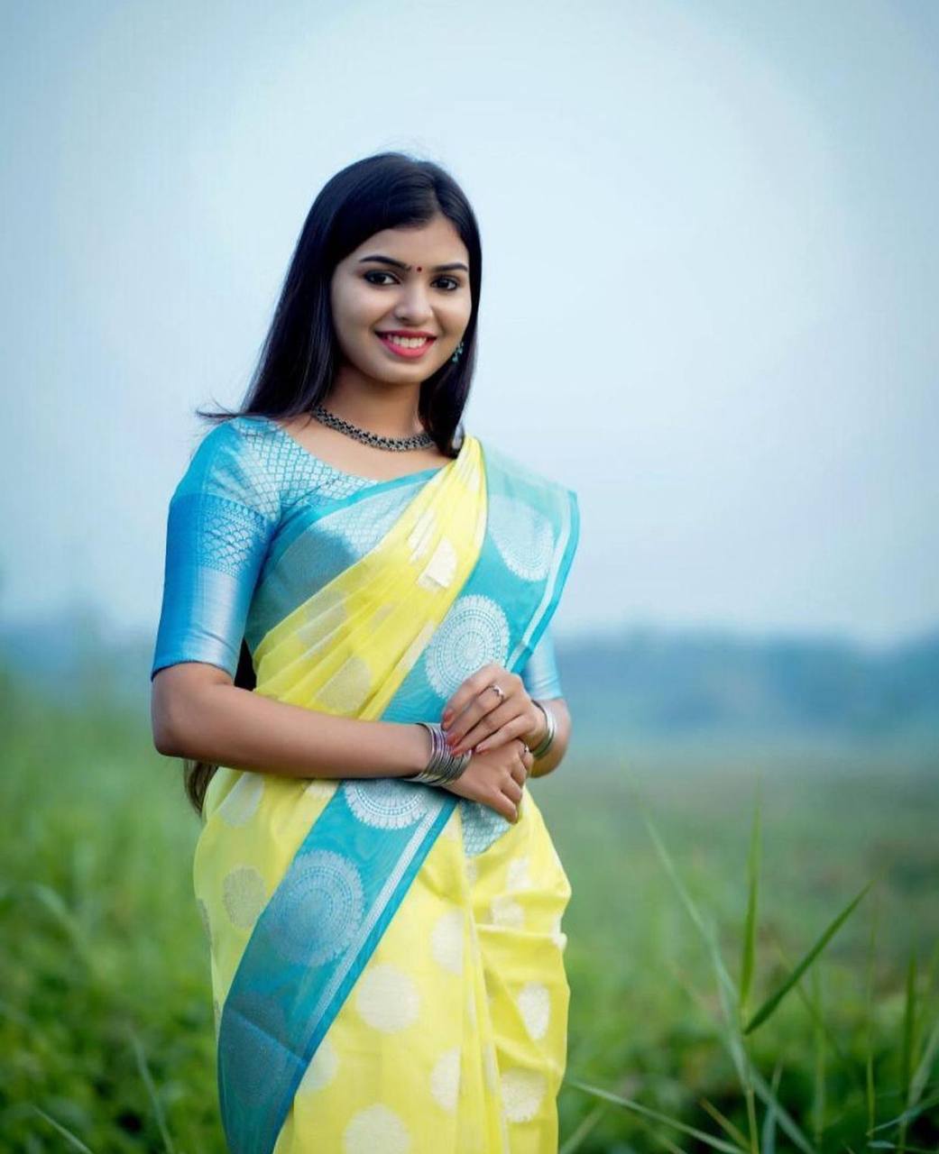 Light Yellow Traditional Kanchipuram Weaving Saree with Rama Border