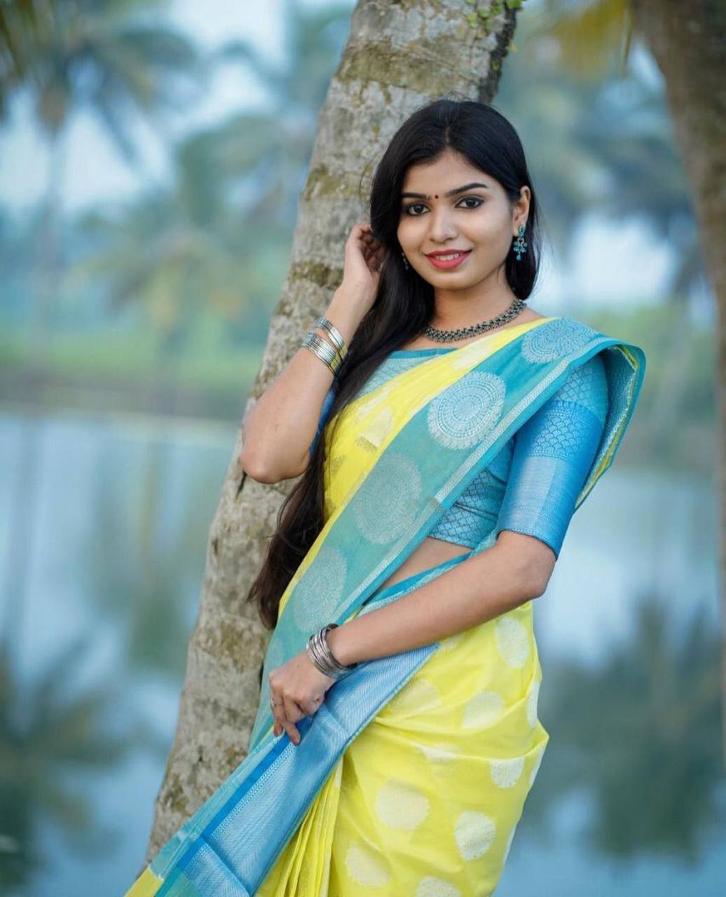 Light Yellow Traditional Kanchipuram Weaving Saree with Rama Border