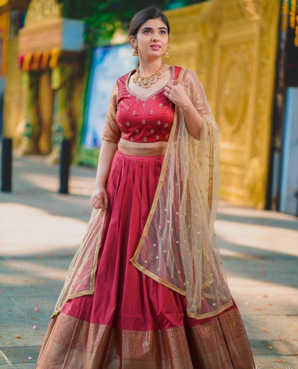 Maroon Kanchipuram Silk Lehenga Choli with Zari Weaving Net Dupatta