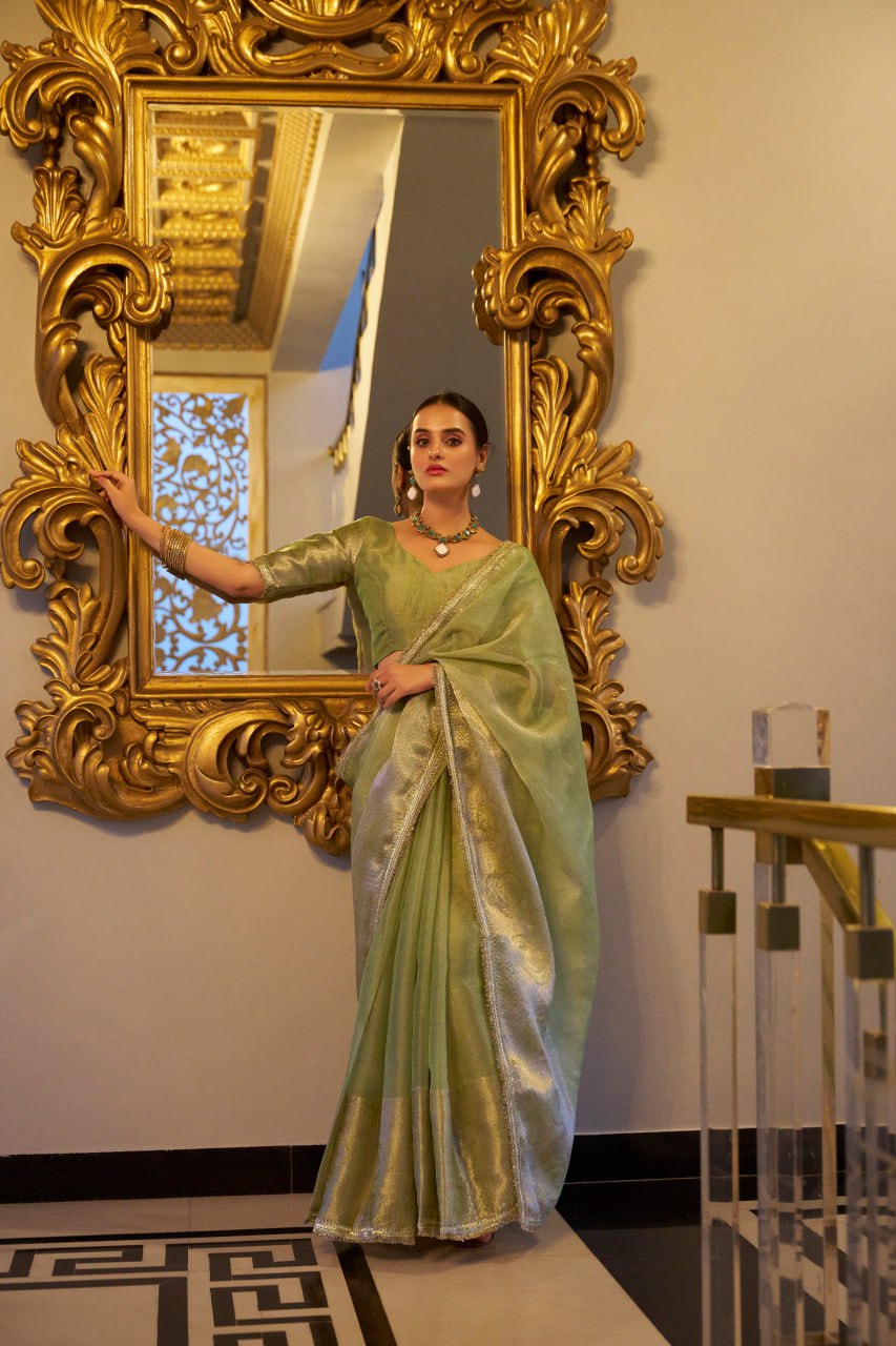 Mint Green Tissue Shimmer Saree with Zari Weaving & Sequins Lace Border