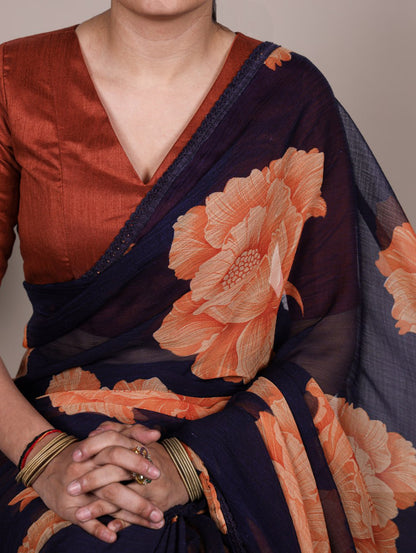 Navy Blue Chiffon Saree With A Orange Floral Print And Lace Border