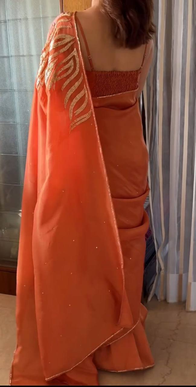 Orange Jimmy Choo Satin Saree with Gold Handwork Border and Blouse