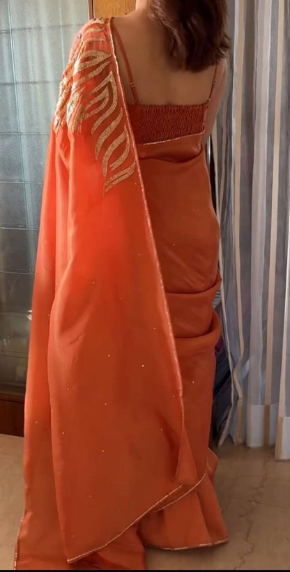 Orange Jimmy Choo Satin Saree with Gold Handwork Border and Blouse