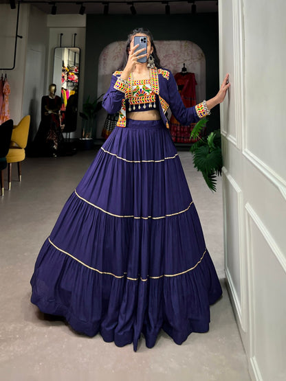 Navratri Lehenga Choli with Koti, Pure Rayon Lehenga Set, Gamthi Work Festival Wear Outfit, Gota Patti Lehenga for Navratri, Designer Navratri Chaniya Choli 2025, Stitched Lehenga Choli with Jacket, Traditional Indian Lehenga Outfit, Cowrie Lace Work Lehenga Choli, Women’s Navratri Garba Dress, Rayon Lehenga Choli with Gamthi Embroidery