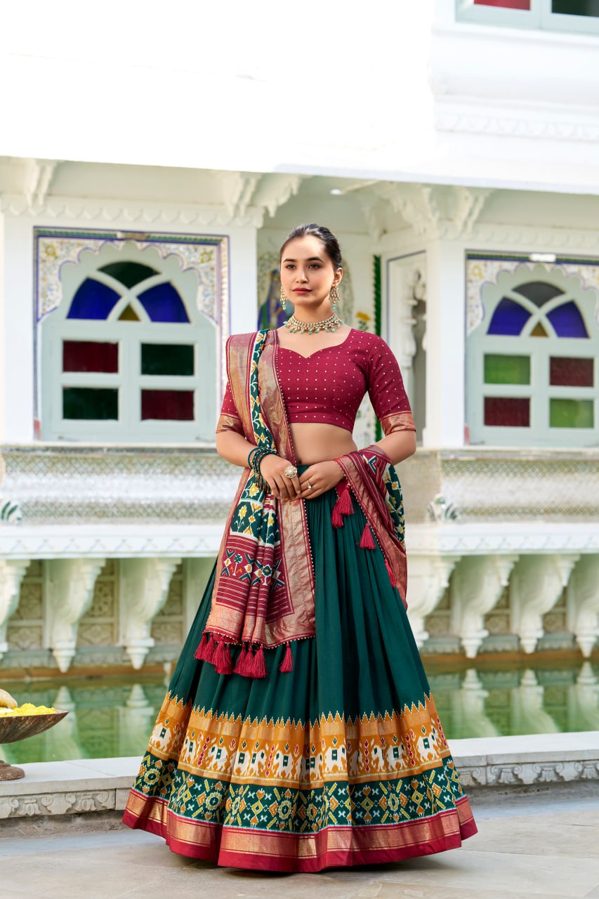 Tussar Silk Traditional Dark Green Patola Print Chaniya Choli for Navratri with Foil Work & Gotta Patti Dupatta