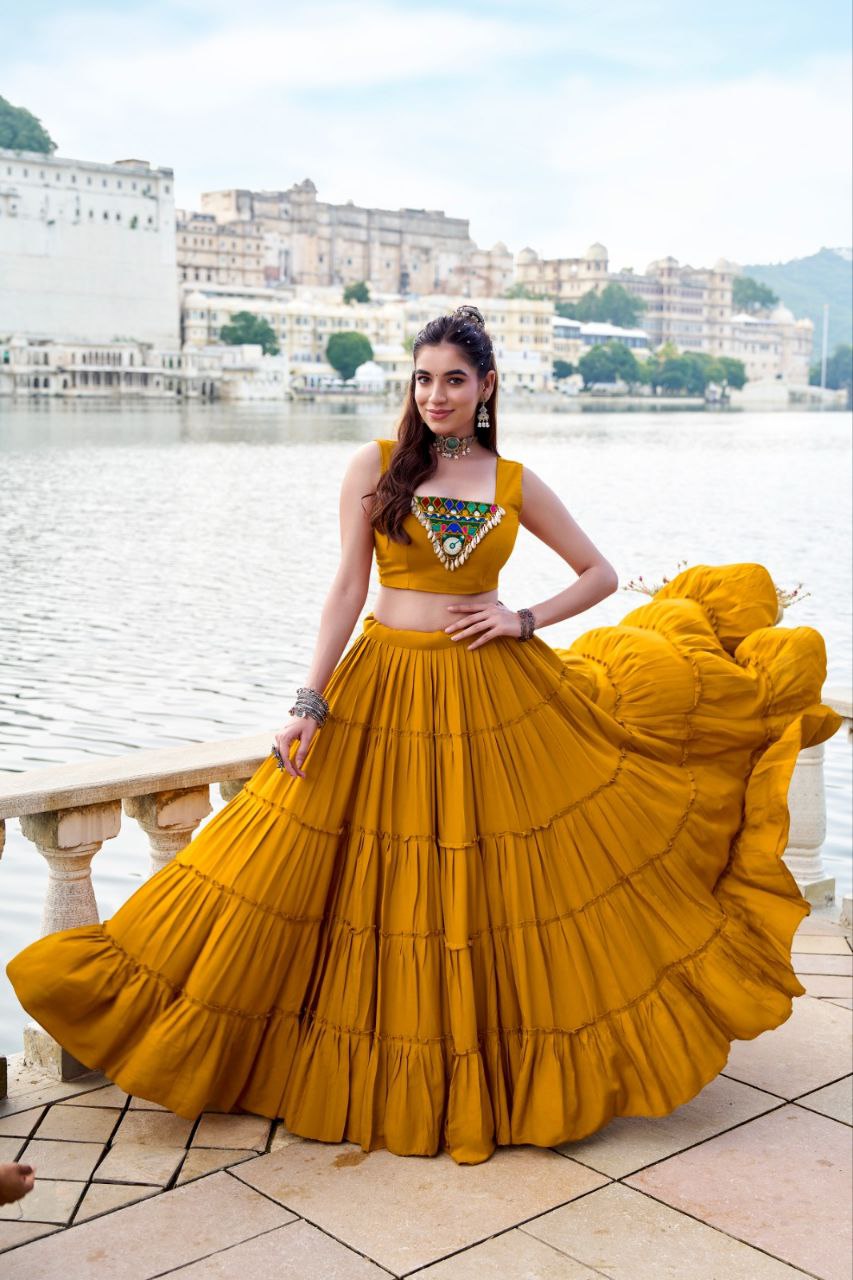 Mustard Yellow Lehenga Choli with Mirror Work and Embroidered Jacket