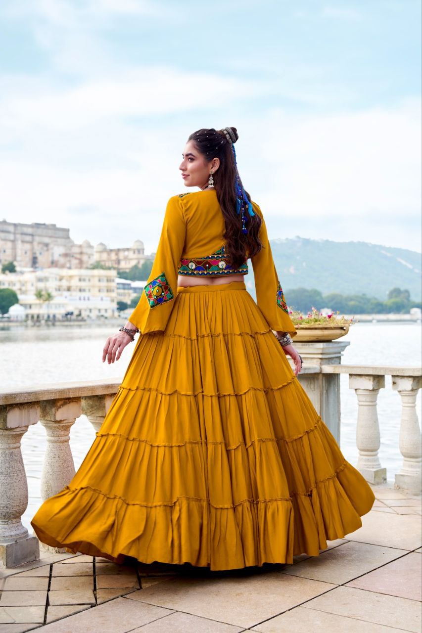 Mustard Yellow Lehenga Choli with Mirror Work and Embroidered Jacket