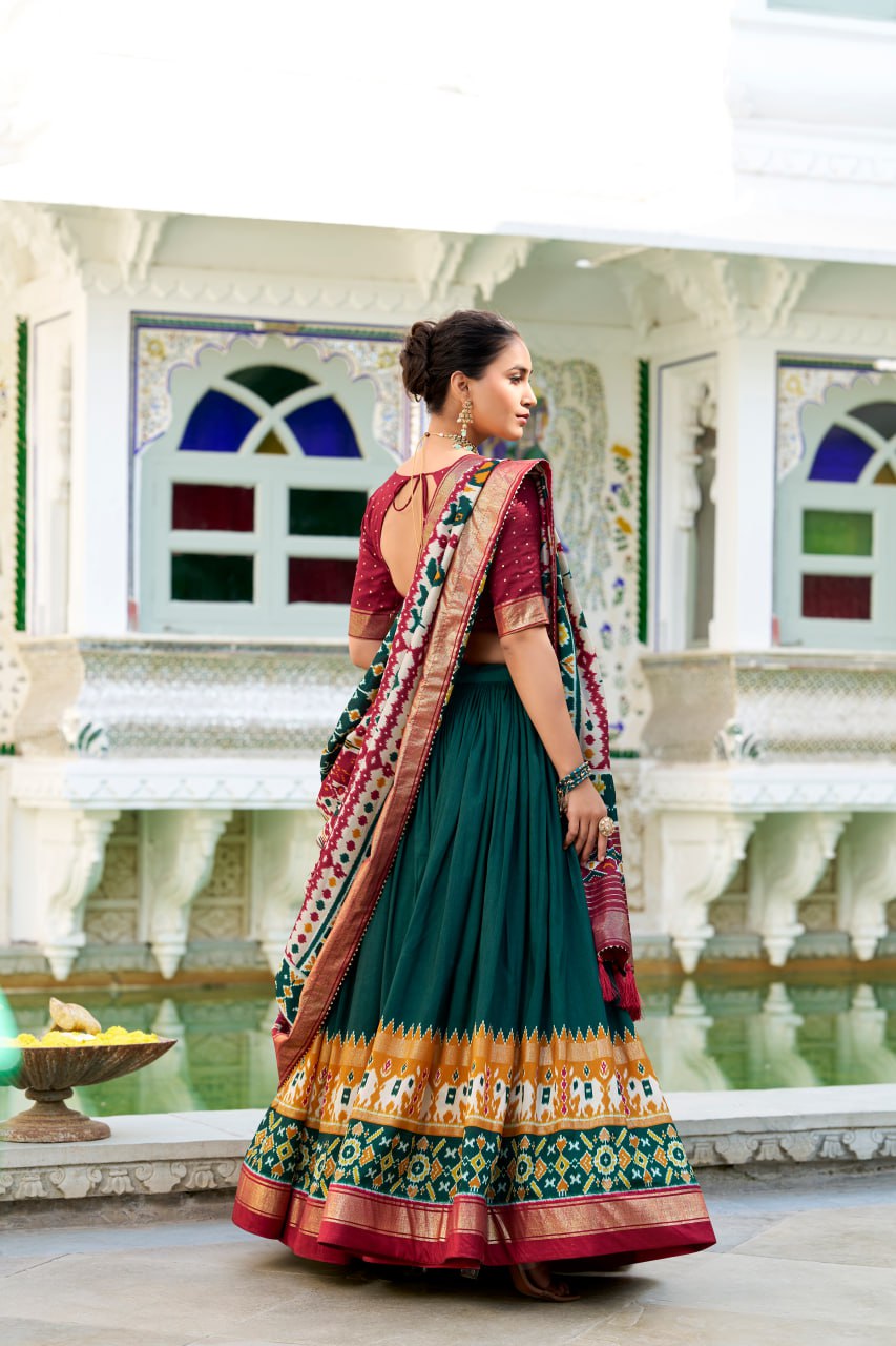 Tussar Silk Traditional Dark Green Patola Print Chaniya Choli for Navratri with Foil Work & Gotta Patti Dupatta