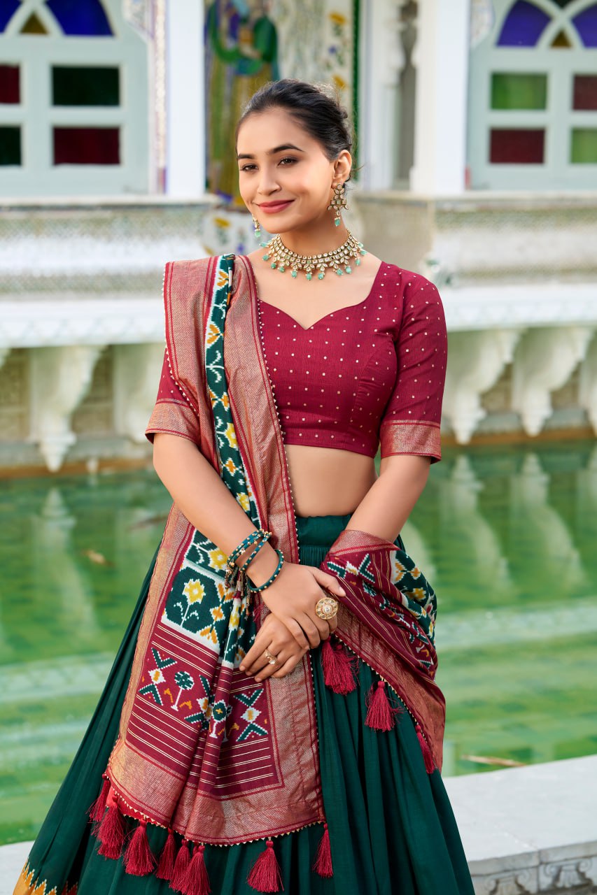 Tussar Silk Traditional Dark Green Patola Print Chaniya Choli for Navratri with Foil Work & Gotta Patti Dupatta