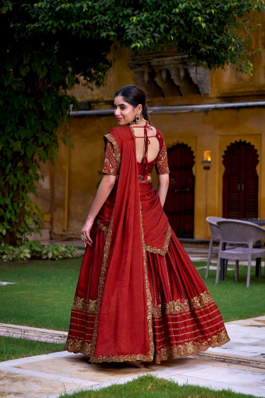Designer Rust Orange Rangoli Silk Party Wear Lehenga Choli