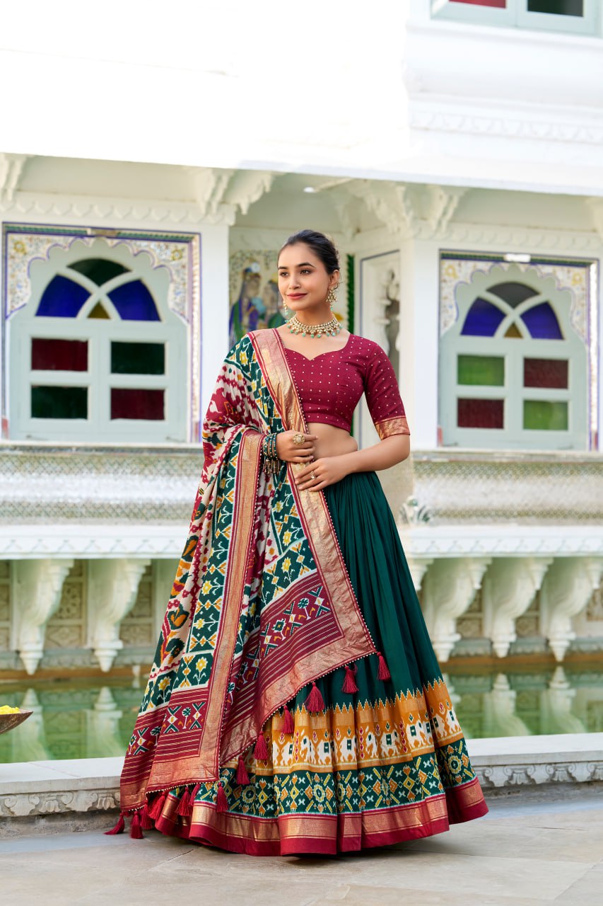 Tussar Silk Traditional Dark Green Patola Print Chaniya Choli for Navratri with Foil Work & Gotta Patti Dupatta