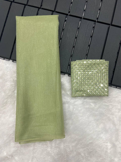 Pistachio Green Rasmalai Silk Saree with Contrast Net Embroidered Blouse