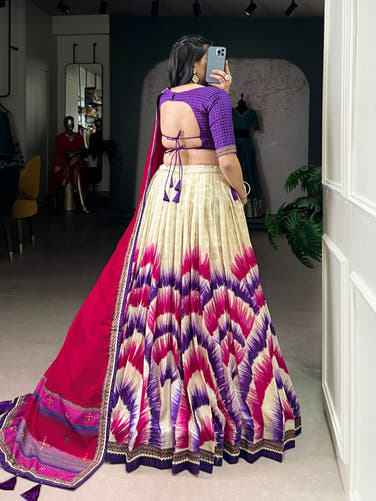 Purple and Cream Tasar Silk Tie-Dye Print Lehenga Choli with matching Dupatta