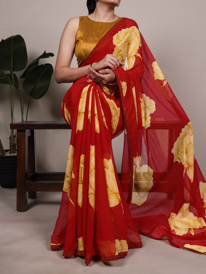 Red Chiffon Saree With A Yellow Floral Print And Lace Border