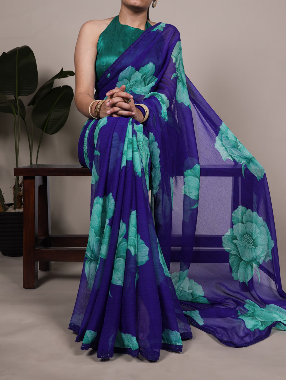 Royal Blue Chiffon Saree With A Floral Print And A Teal Green Blouse