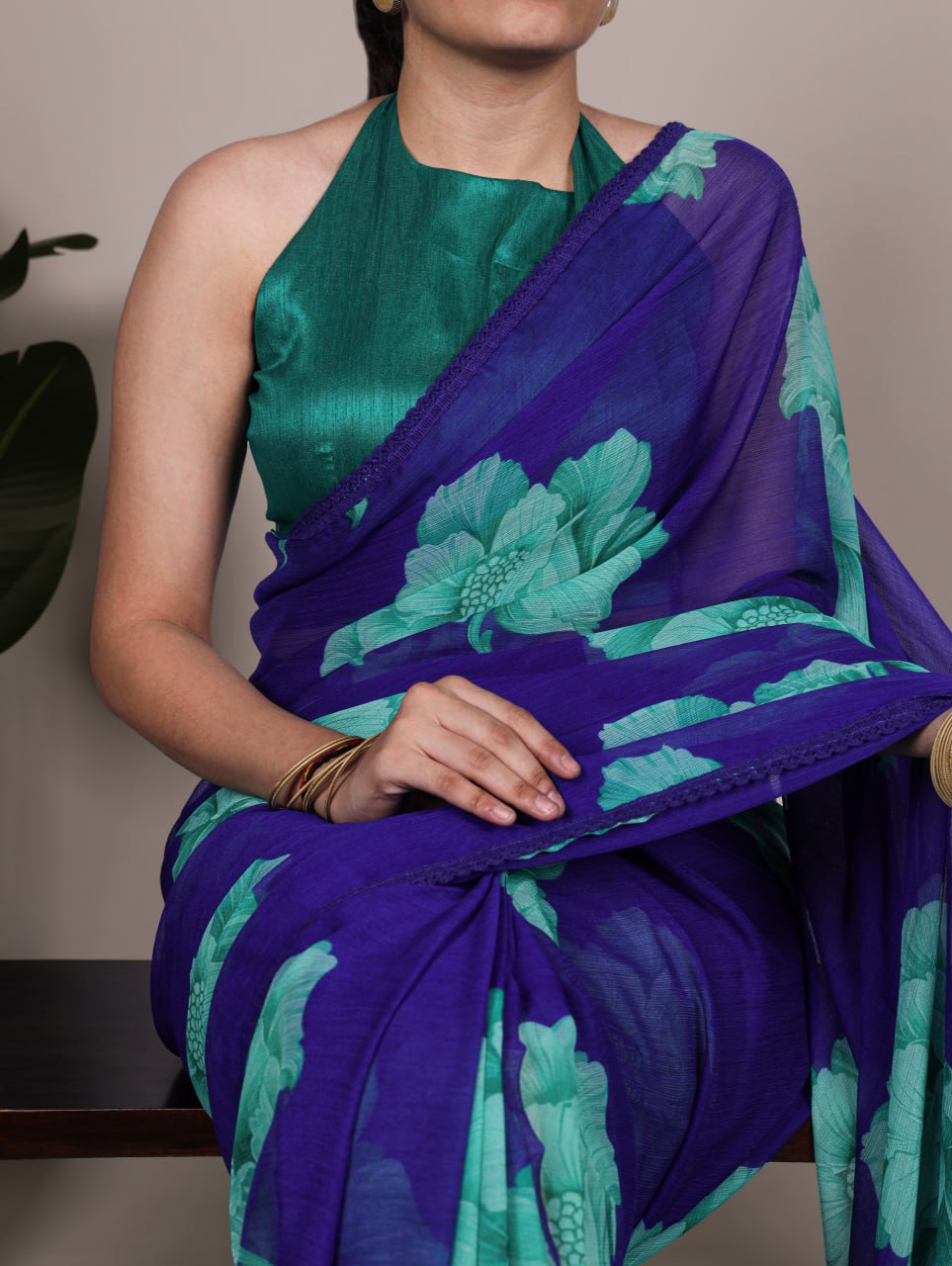 Royal Blue Chiffon Saree With A Floral Print And A Teal Green Blouse