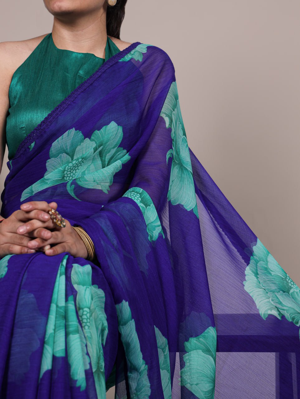 Royal Blue Chiffon Saree With A Floral Print And A Teal Green Blouse