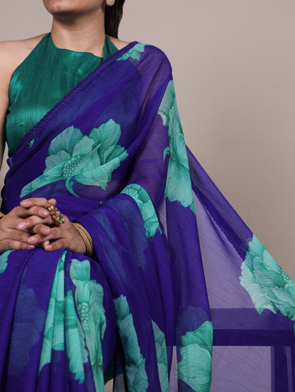 Royal Blue Chiffon Saree With A Floral Print And A Teal Green Blouse