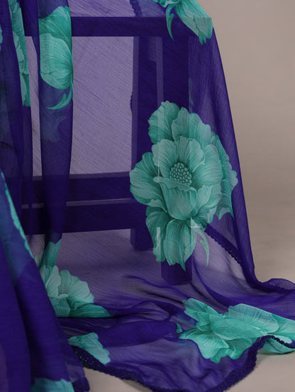 Royal Blue Chiffon Saree With A Floral Print And A Teal Green Blouse