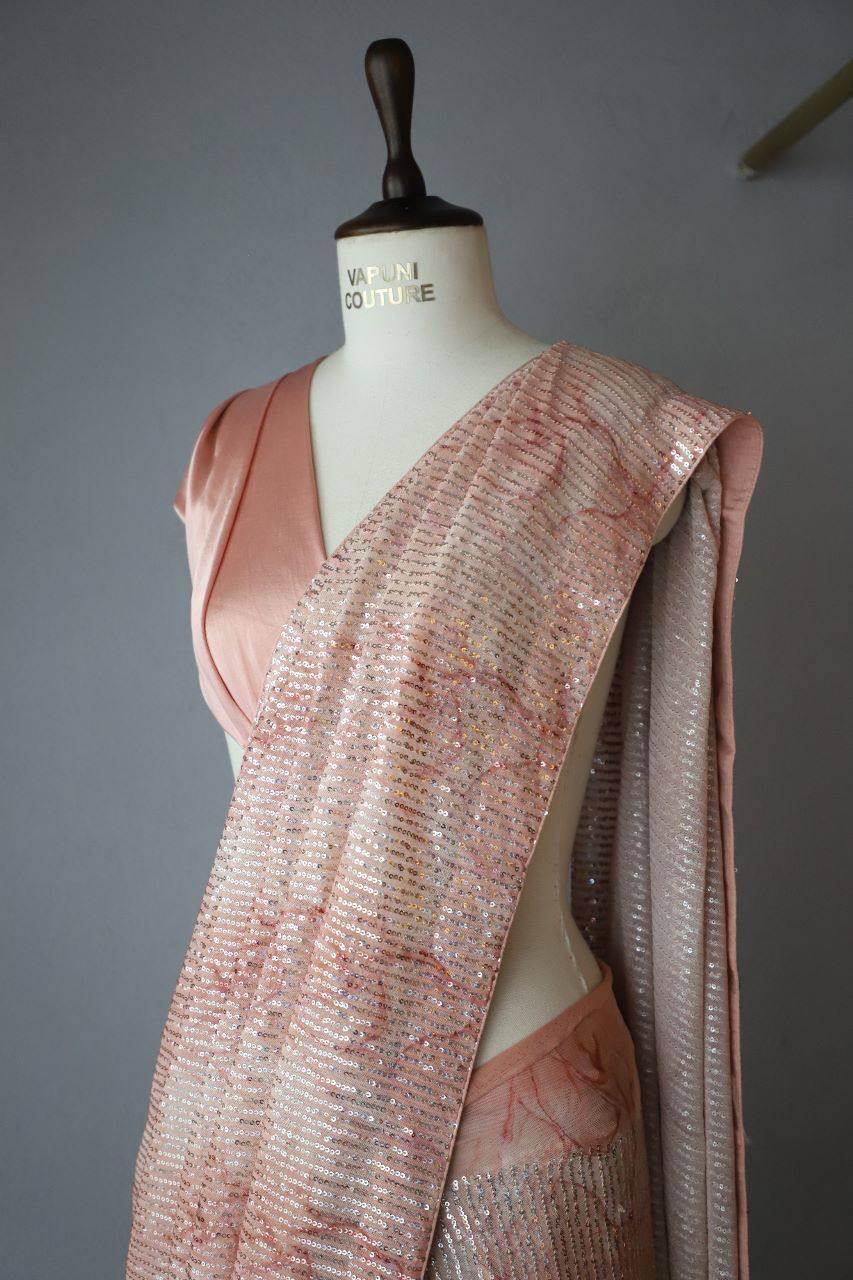 Soft Peach Georgette Digital Print Saree with Full Sequins Border