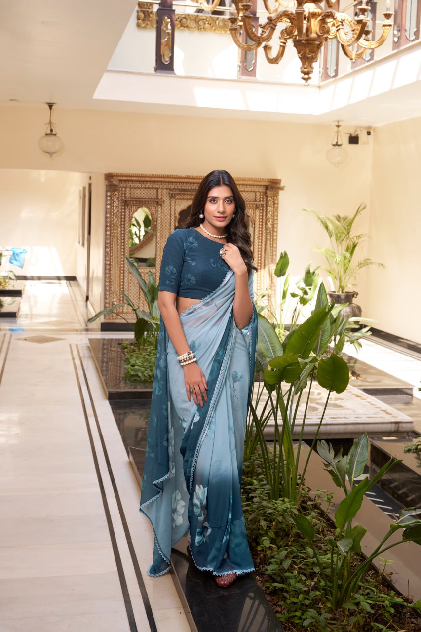 Teal Blue Weightless Marble Printed Saree with Floral Design Lace Border
